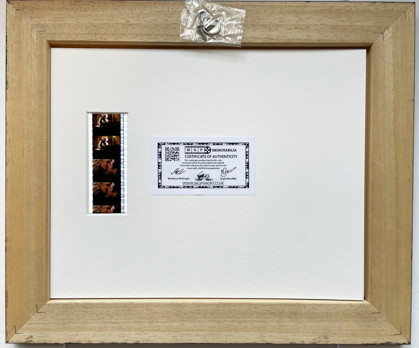 Handmade display featuring original 35mm filmcells for a Phenomenon fan + COA v2