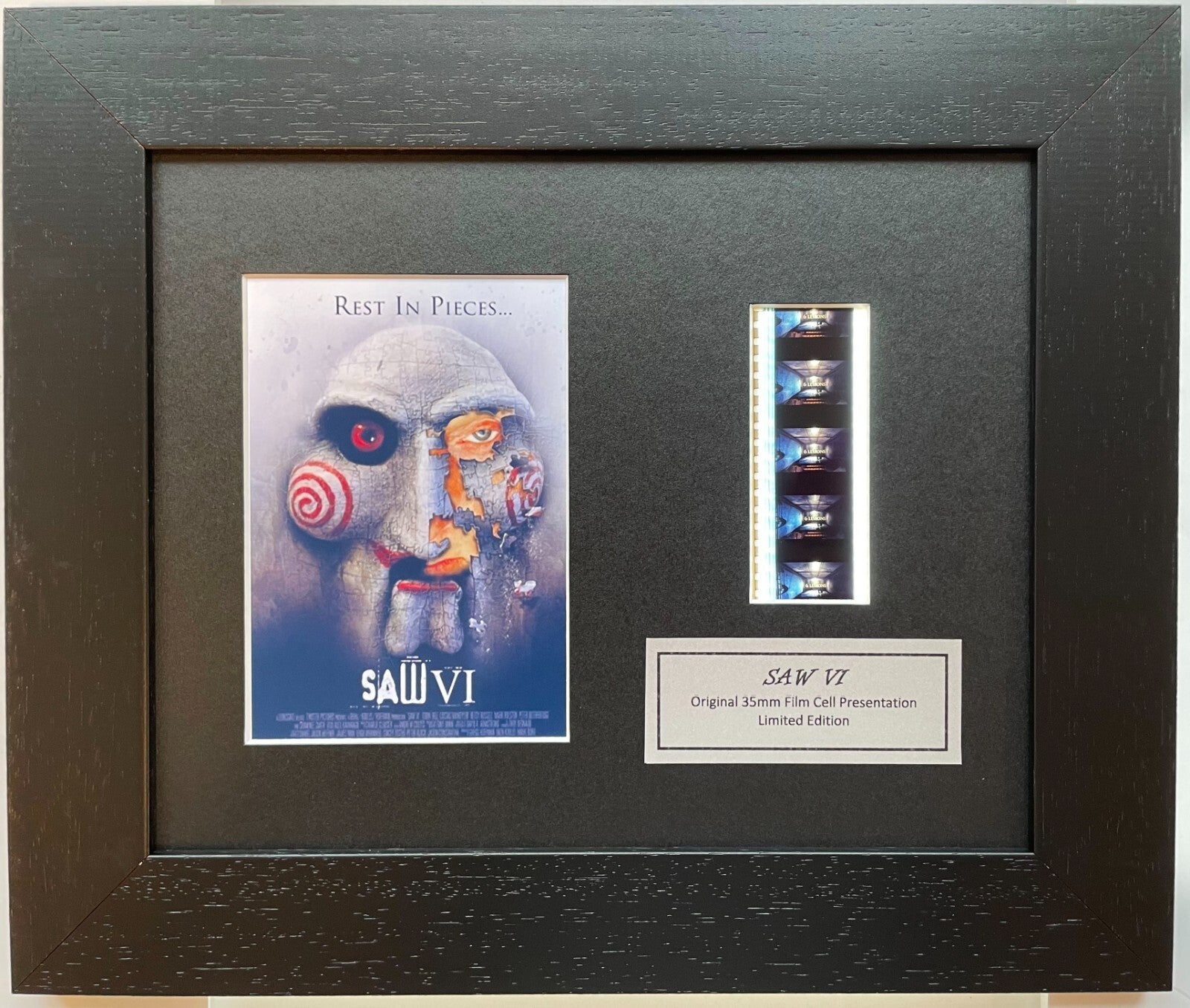 Hand crafted display featuring original 35mm film cells for a SAW VI fan + COA