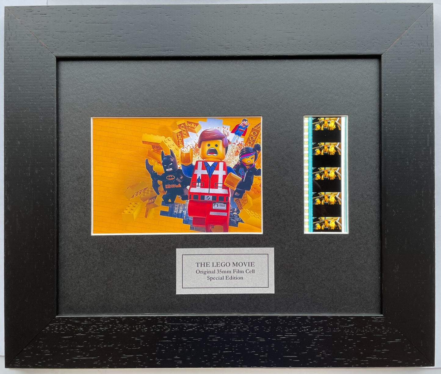 Hand crafted display featuring original 35mm film cells for THE LEGO MOVIE fans