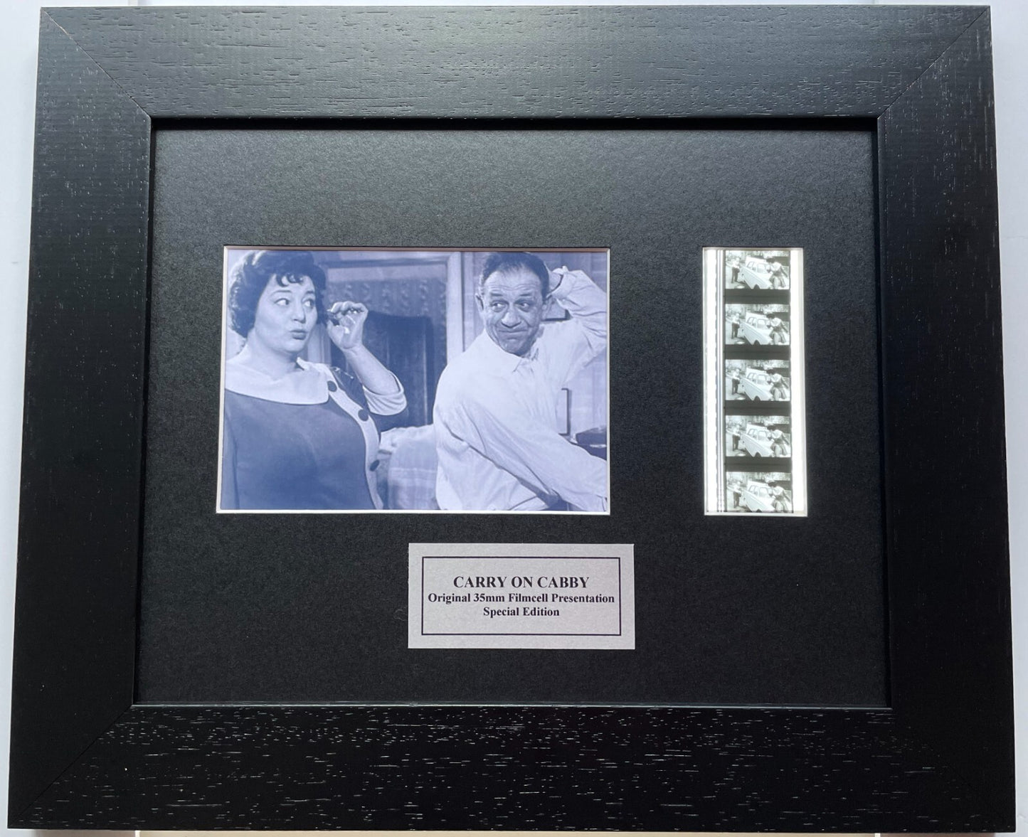 Hand crafted display featuring original 35mm film cells for CARRY ON CABBY fans