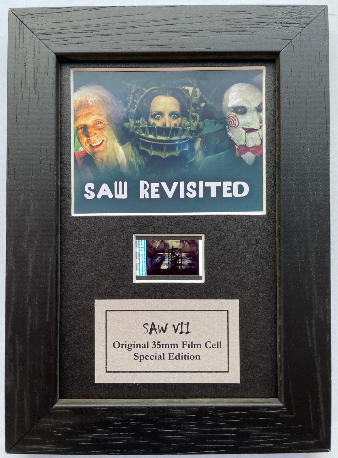 Handmade display featuring original Mini 35mm film cells for a SAW VII fan