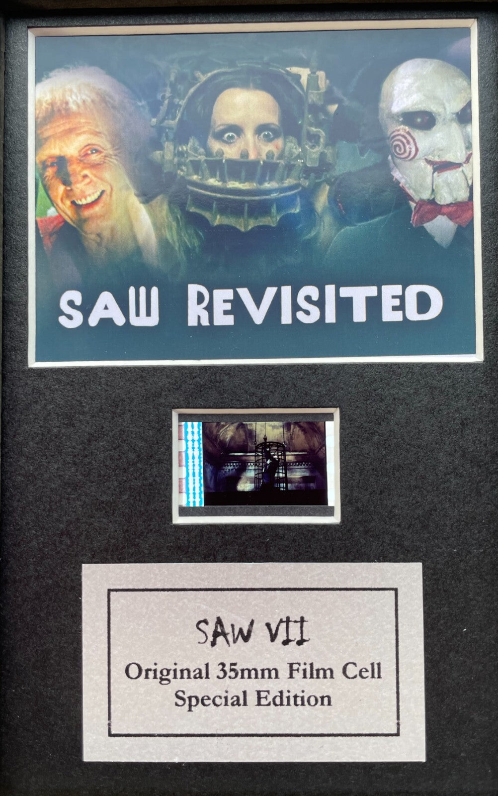Handmade display featuring original Mini 35mm film cells for a SAW VII fan