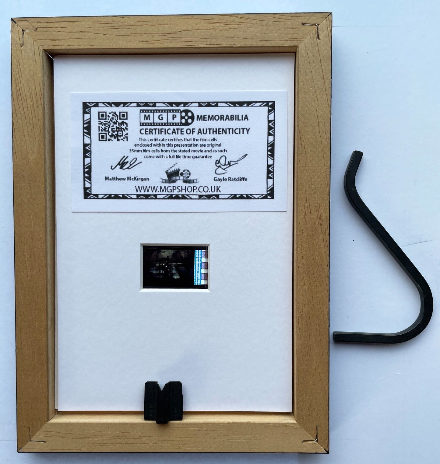 Handmade display featuring original Mini 35mm film cells for a SAW VII fan