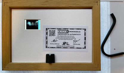 Handmade display featuring original Mini 35mm film cells for a SAW fan + COA