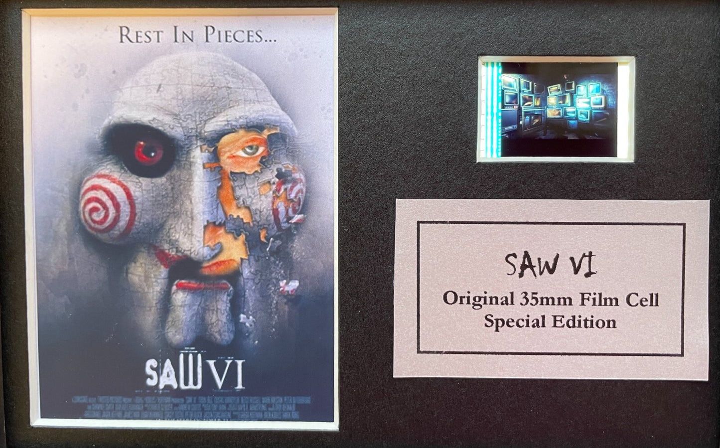 Handmade display featuring original Mini 35mm film cells for a SAW fan + COA