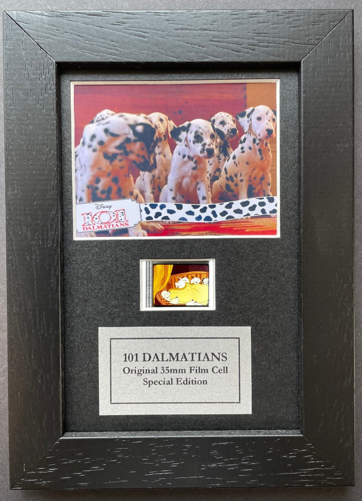Hand crafted display featuring original 35mm film cells for 101 DALMATIANS fans