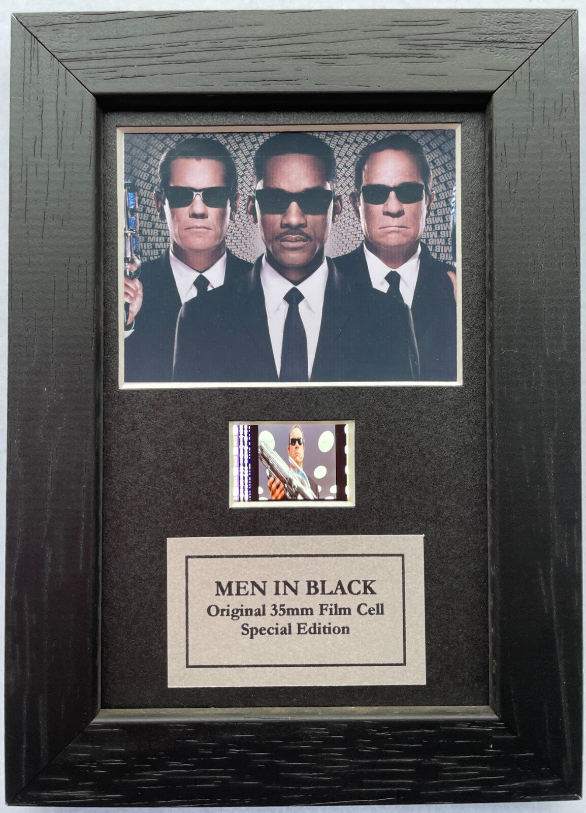 Handmade display featuring original Mini 35mm film cells for a Men In Black fan