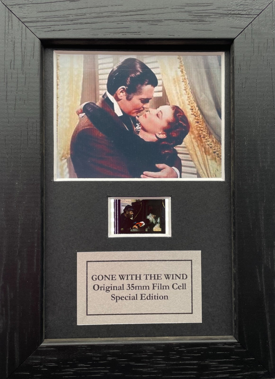 Handmade Mini display featuring original film cells for a GONE with the WIND fan