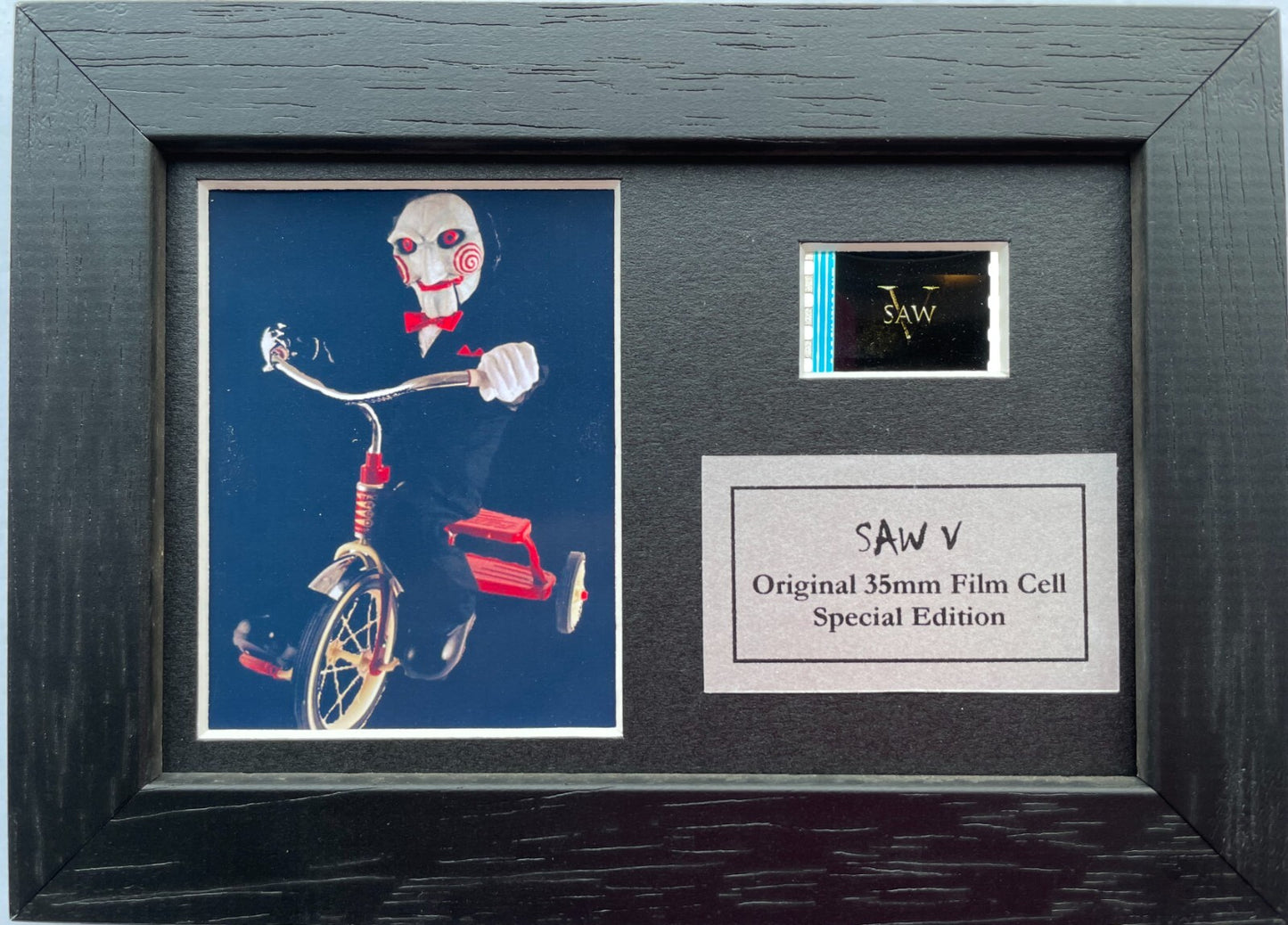 Hand crafted display featuring original Mini 35mm film cells for a Saw V fan