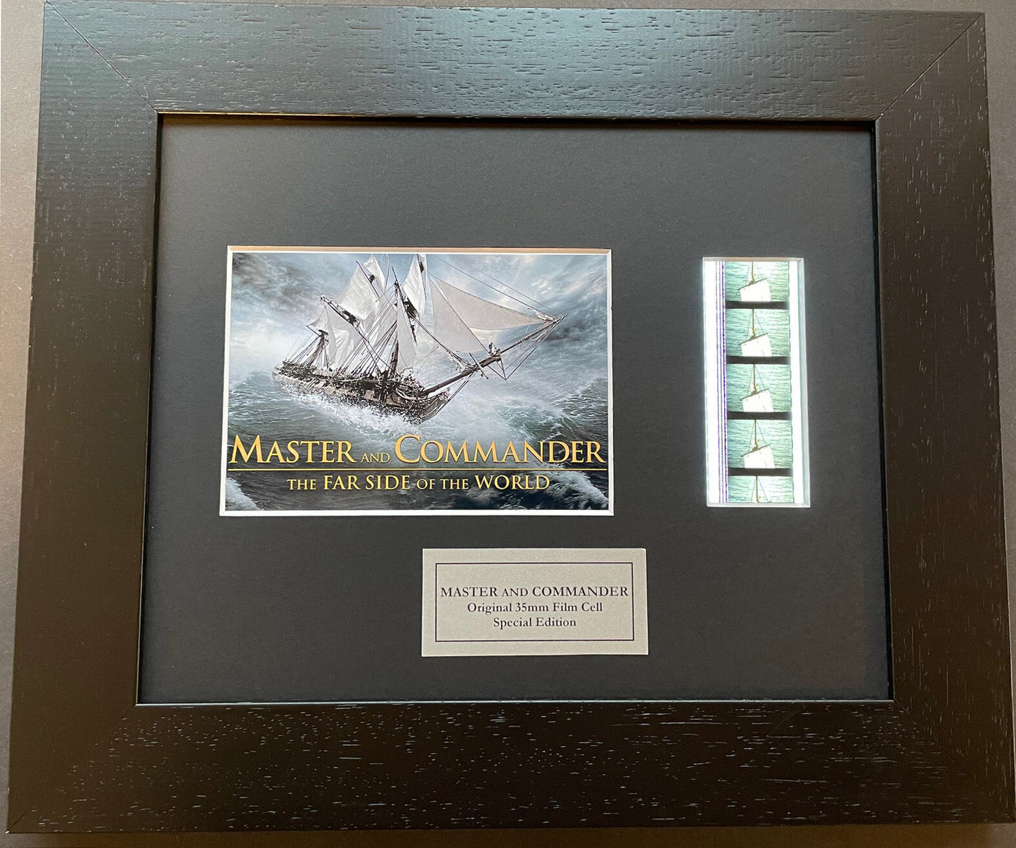 MASTER and COMMANDER Original 35mm Film Cells set within Quality Wood Frame + COA