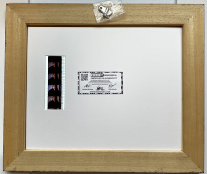 Handmade display featuring original 35mm film cells for a Conspiracy Theory fan