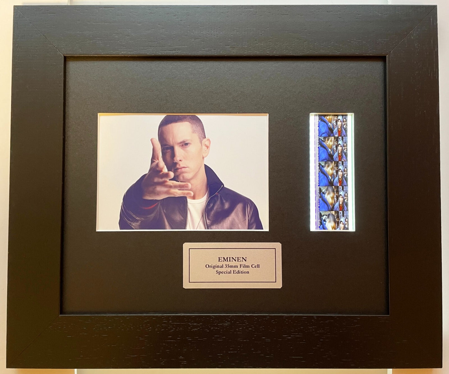 Handmade display featuring original 35mm film cells for an EMINEN fan + COA