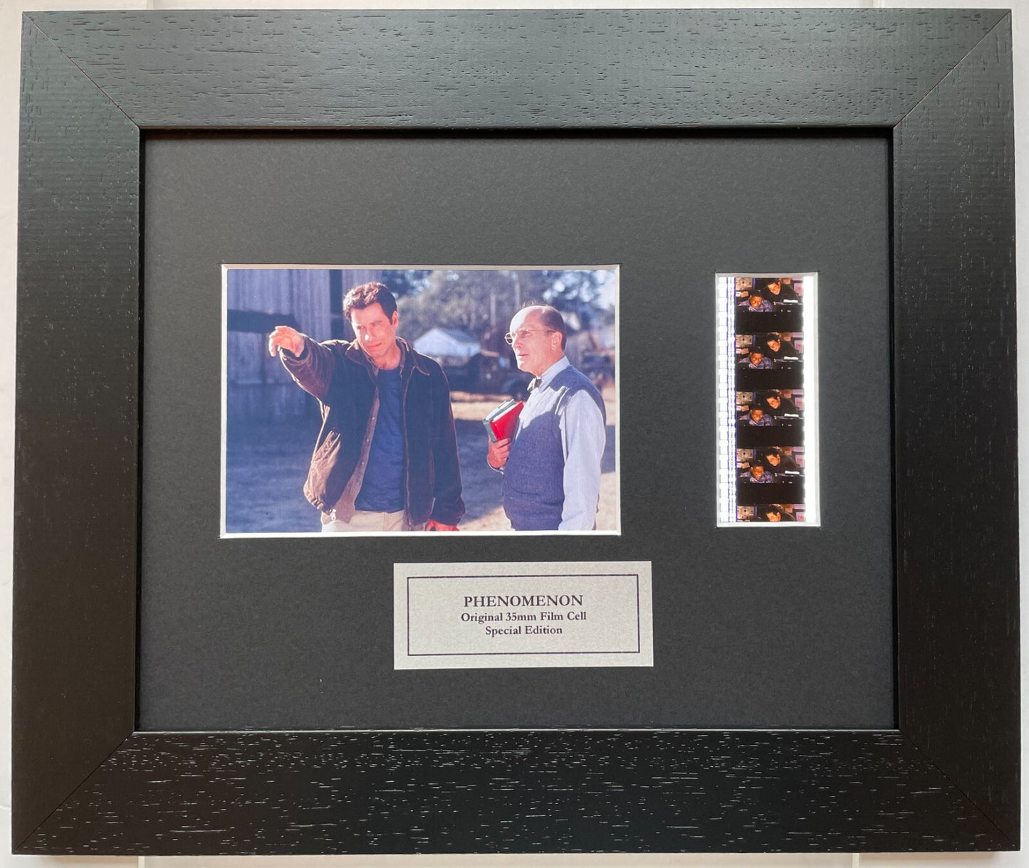 Handmade display featuring original 35mm filmcells for a Phenomenon fan + COA v1