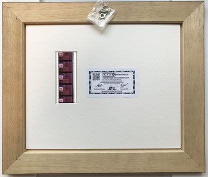 Handmade display featuring original 35mm film cells for a TOTAL RECALL fan + COA