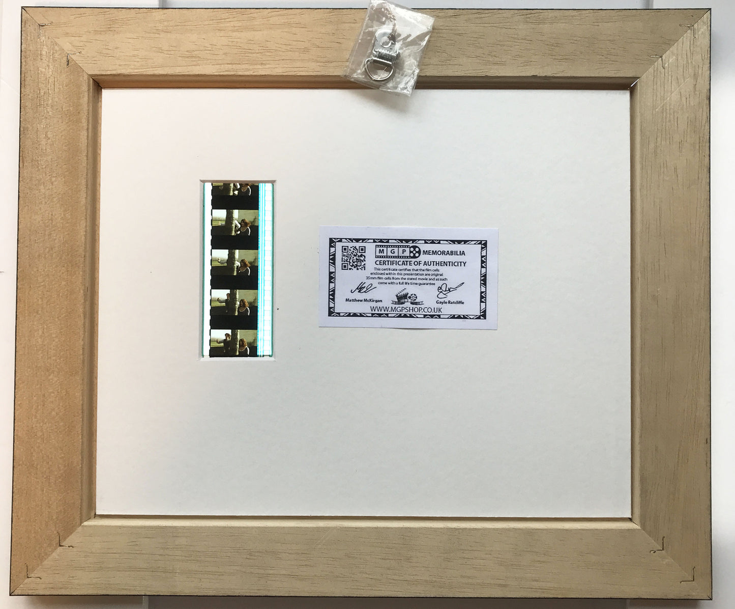 Handmade display featuring original 35mm film cells for SCARY MOVIE 4 fans + COA