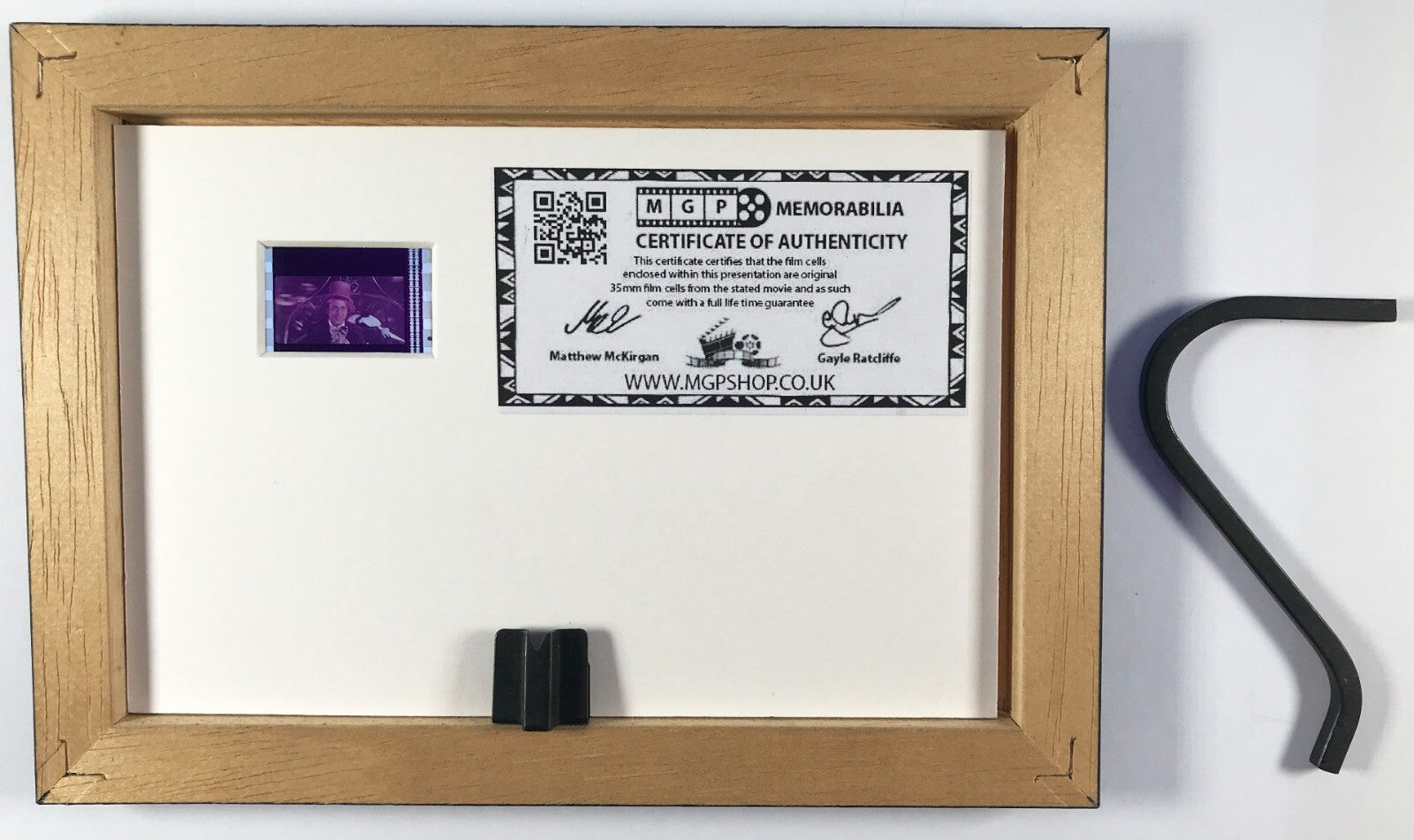 Hand crafted display featuring original 35mm film cells for a WILLY WONKA fan