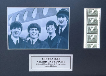 Hand crafted display featuring original film cells for The Beatles fans  vHDN