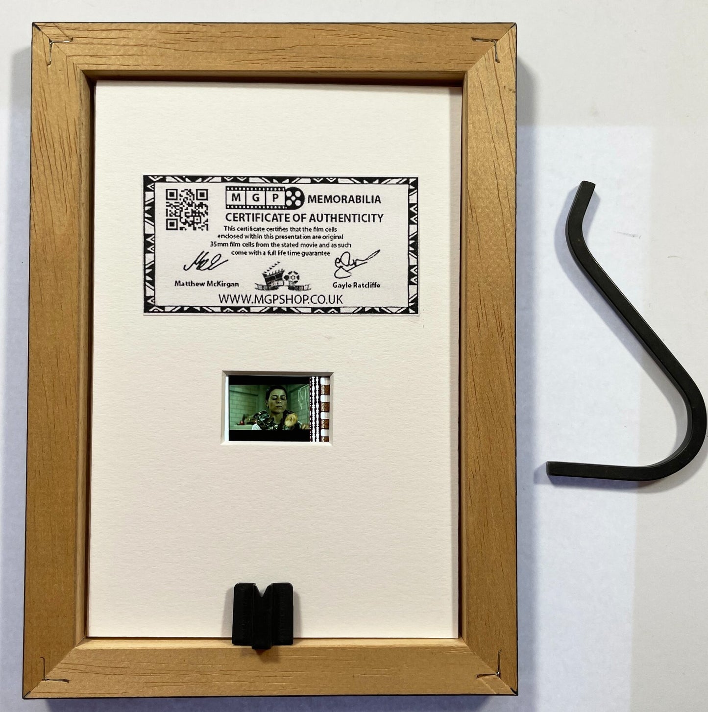 Handmade display featuring original Mini 35mm film cells for a SAW III fan + COA