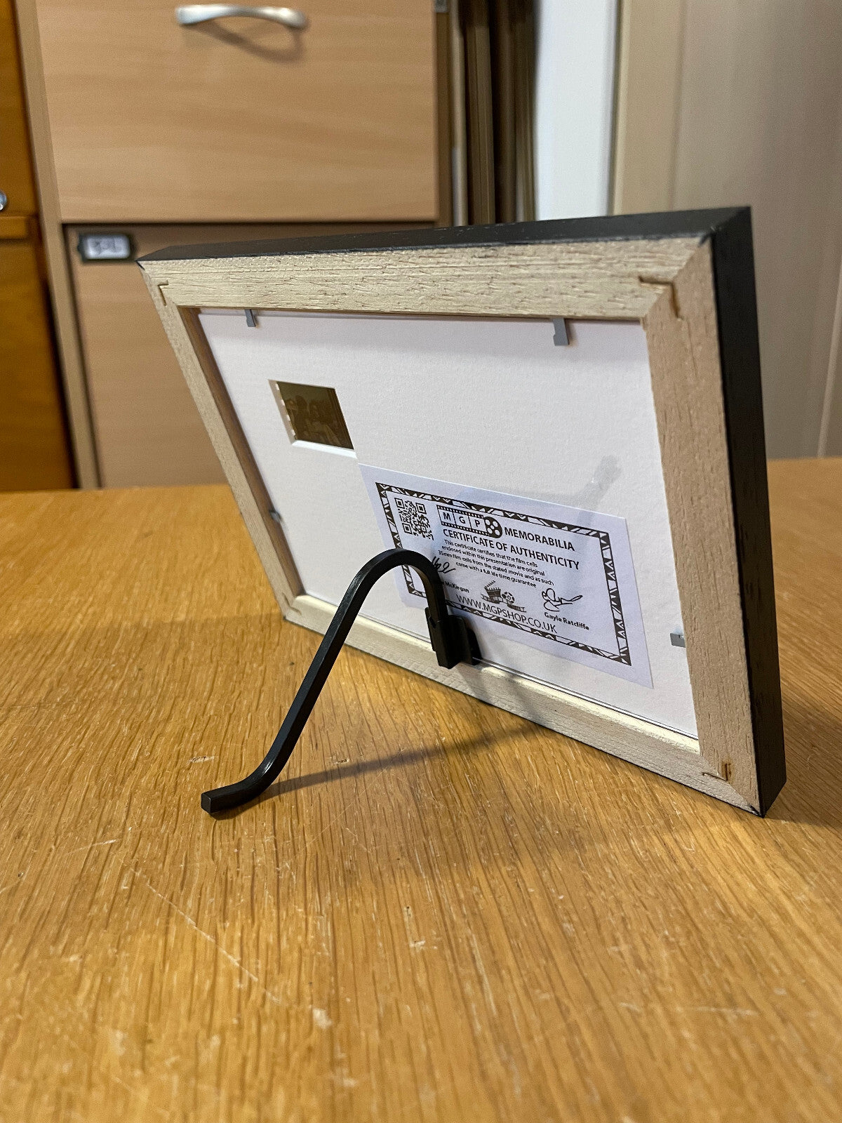 Hand crafted display featuring original film cell for MASTER & COMMANDER fans