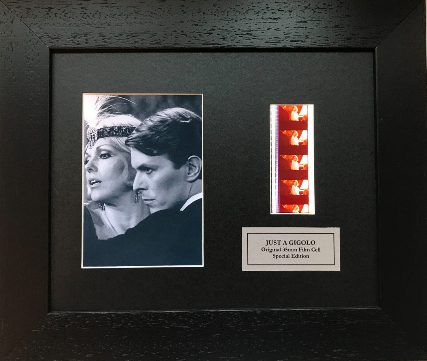 Handmade display featuring original 35mm film cells for JUST A GIGOLO 1978 fans
