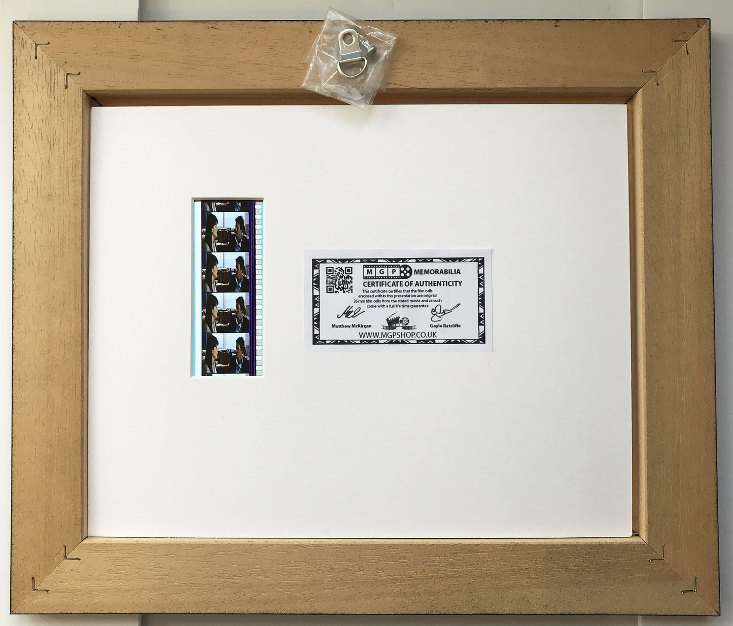 Hand Crafted display featuring original 35mm filmcells for TWO WEEKS NOTICE fans