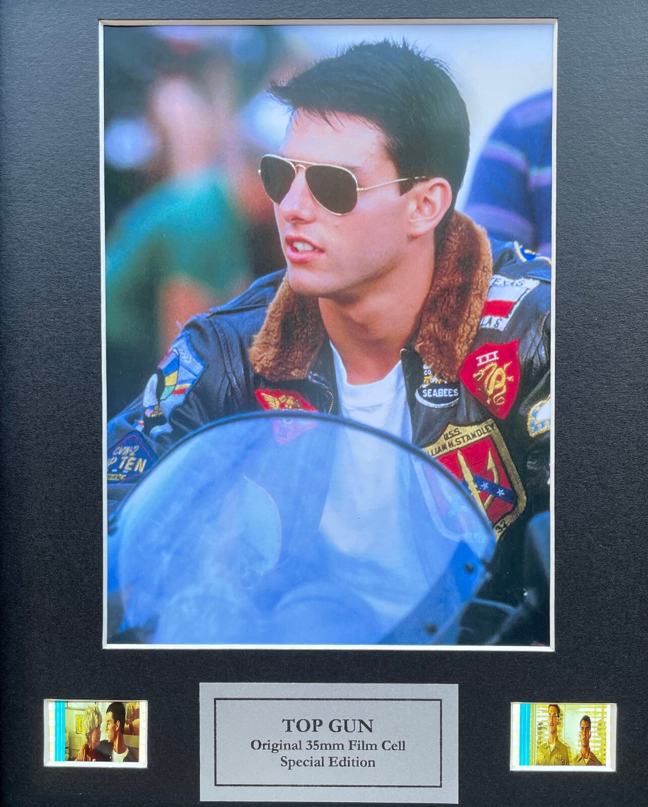 Hand crafted display featuring original film cells for a Top Gun fan + Coa