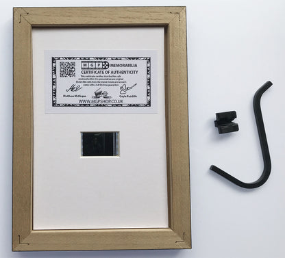 Handmade display featuring original Mini 35mm film cells for a TOTAL RECALL fan