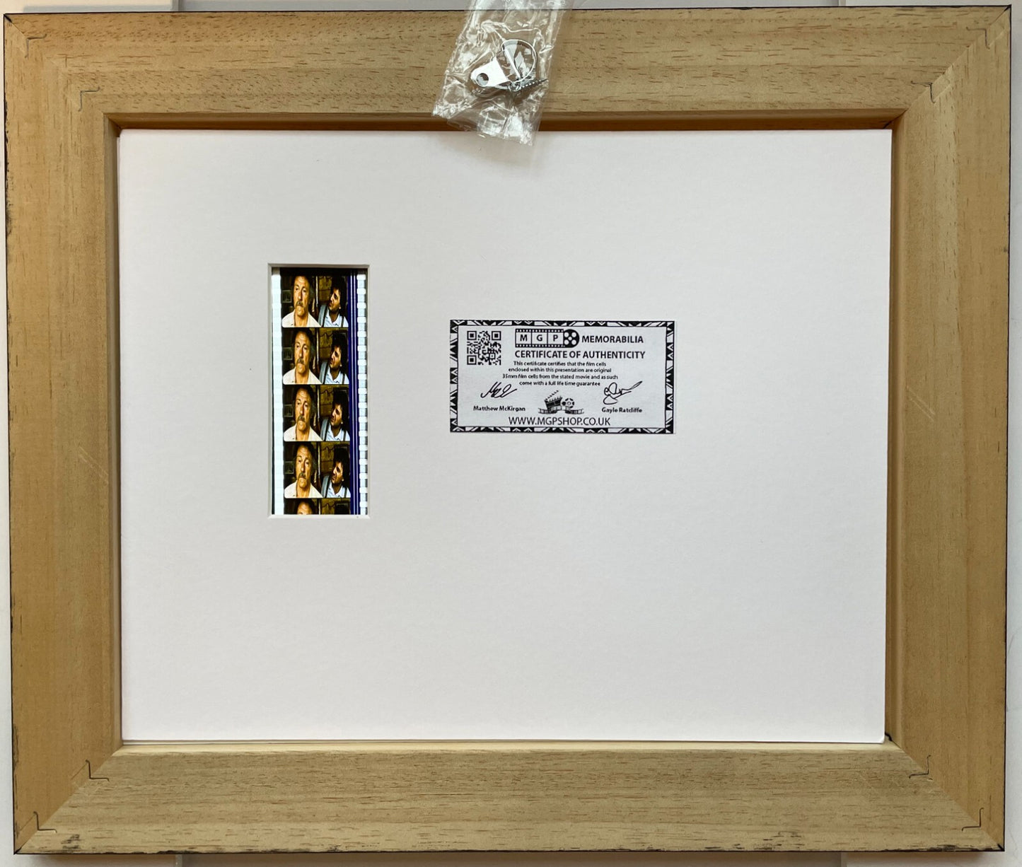 Handmade display featuring original 35mm filmcells for GUNSLINGER'S REVENGE fans