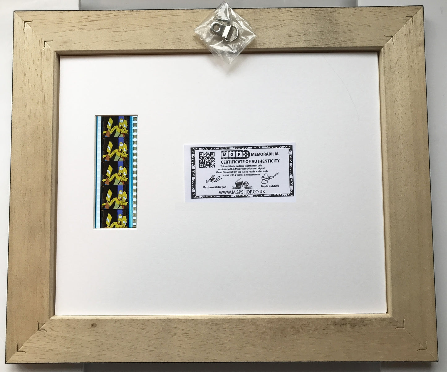 Hand crafted display featuring original film cells for THE SIMPSONS MOVIE fans