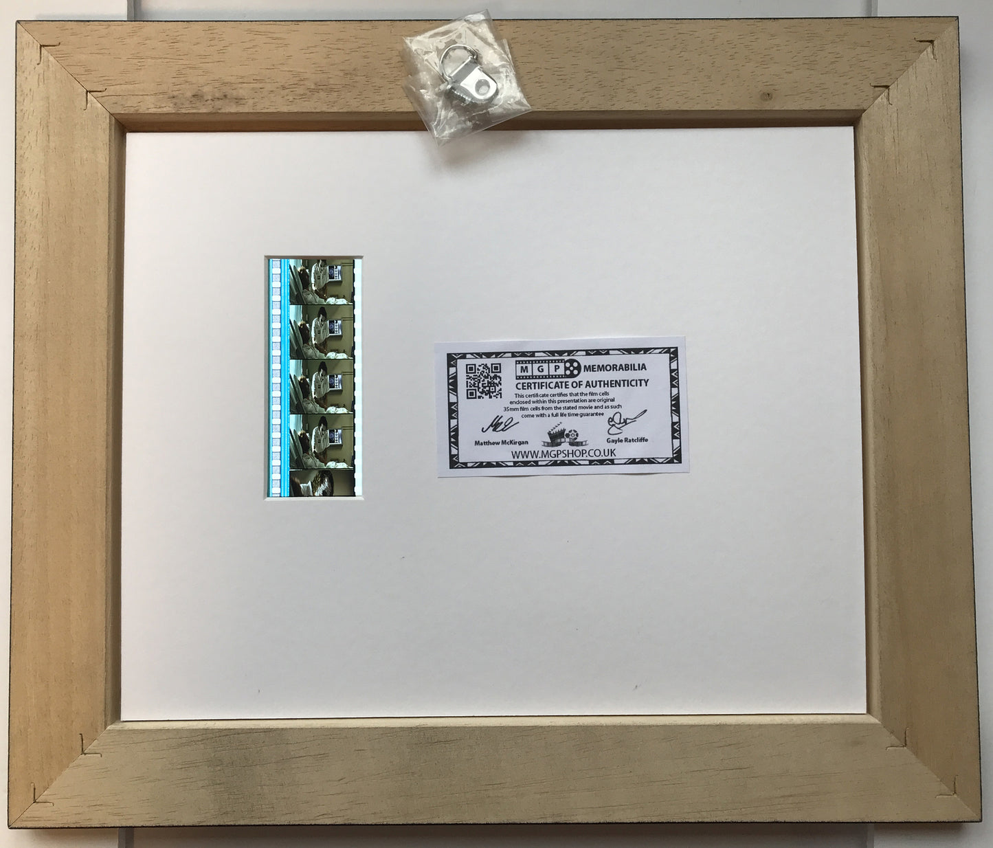 Hand crafted display featuring original filmcells for THE JOKER Dark Knight fans