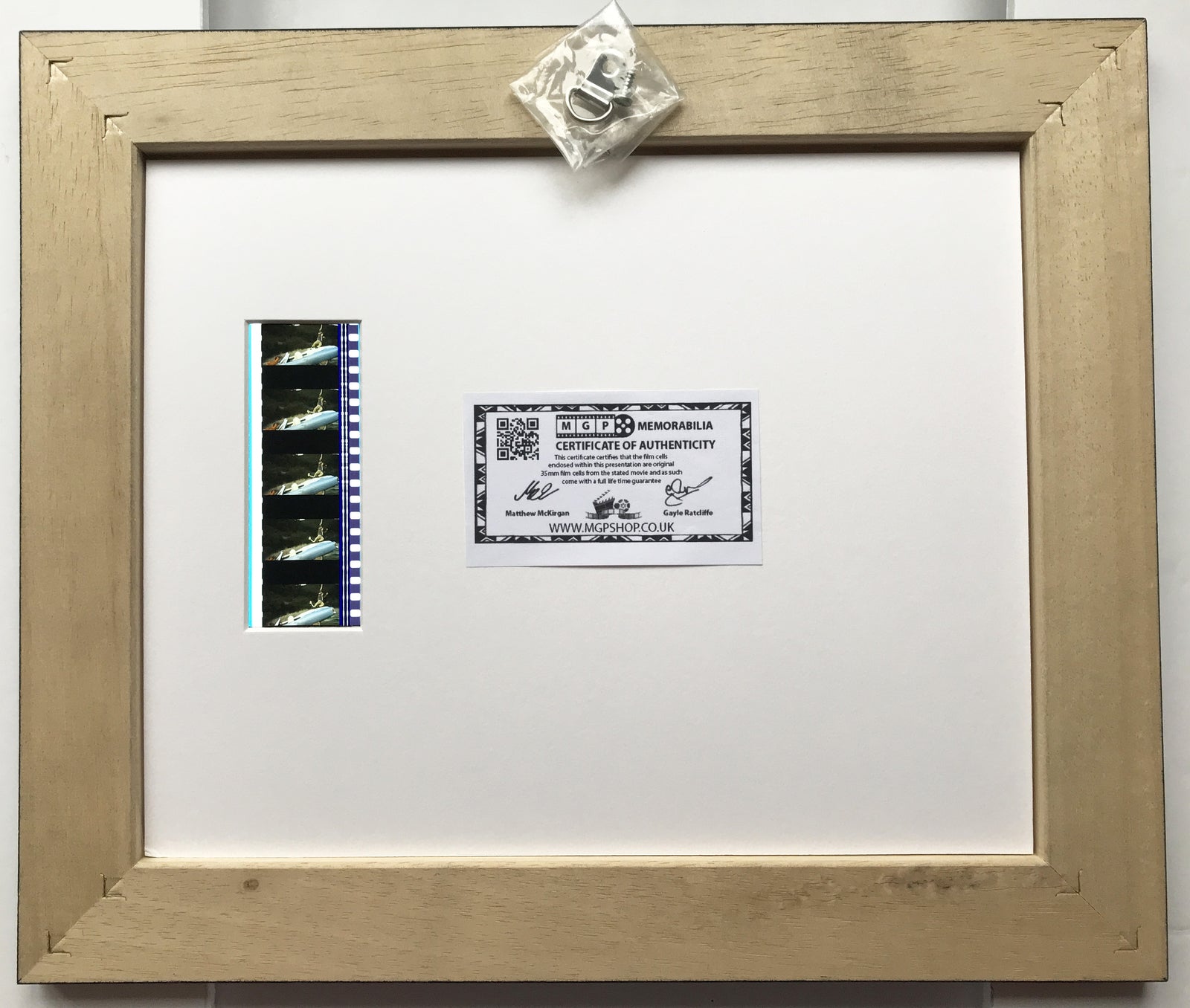Hand crafted display featuring original 35mm film cells for a RAT RACE fan v1