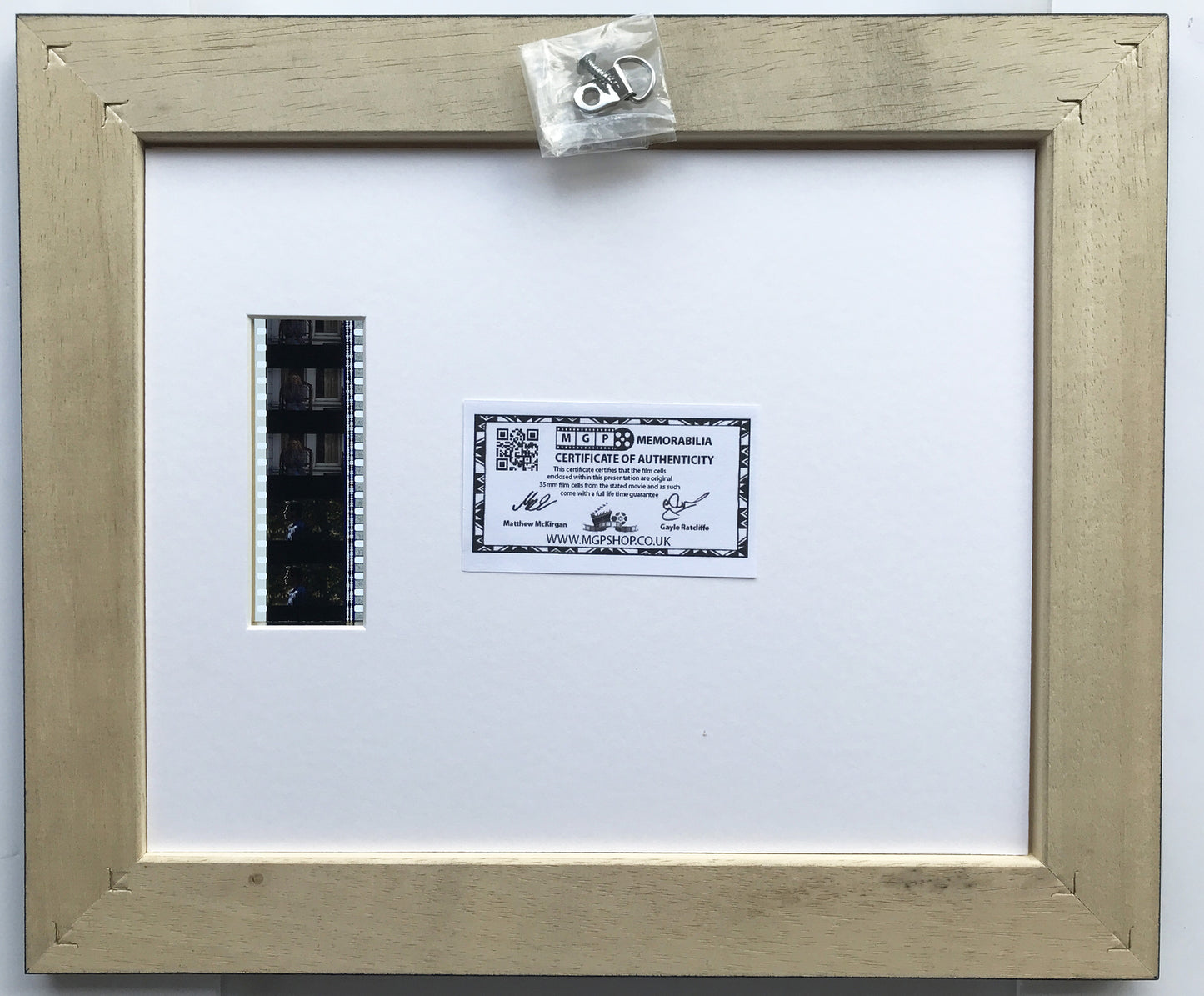 Handmade display featuring original 35mm film cells for a Phenomenon fan vSR