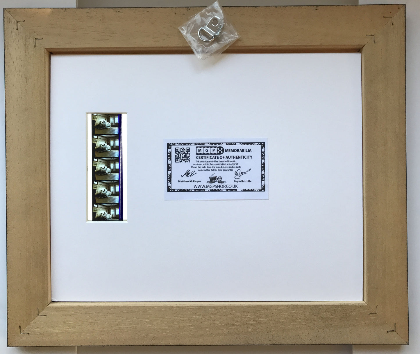 Hand crafted display featuring original 35mm filmcells for a MISERY fan + COA v2