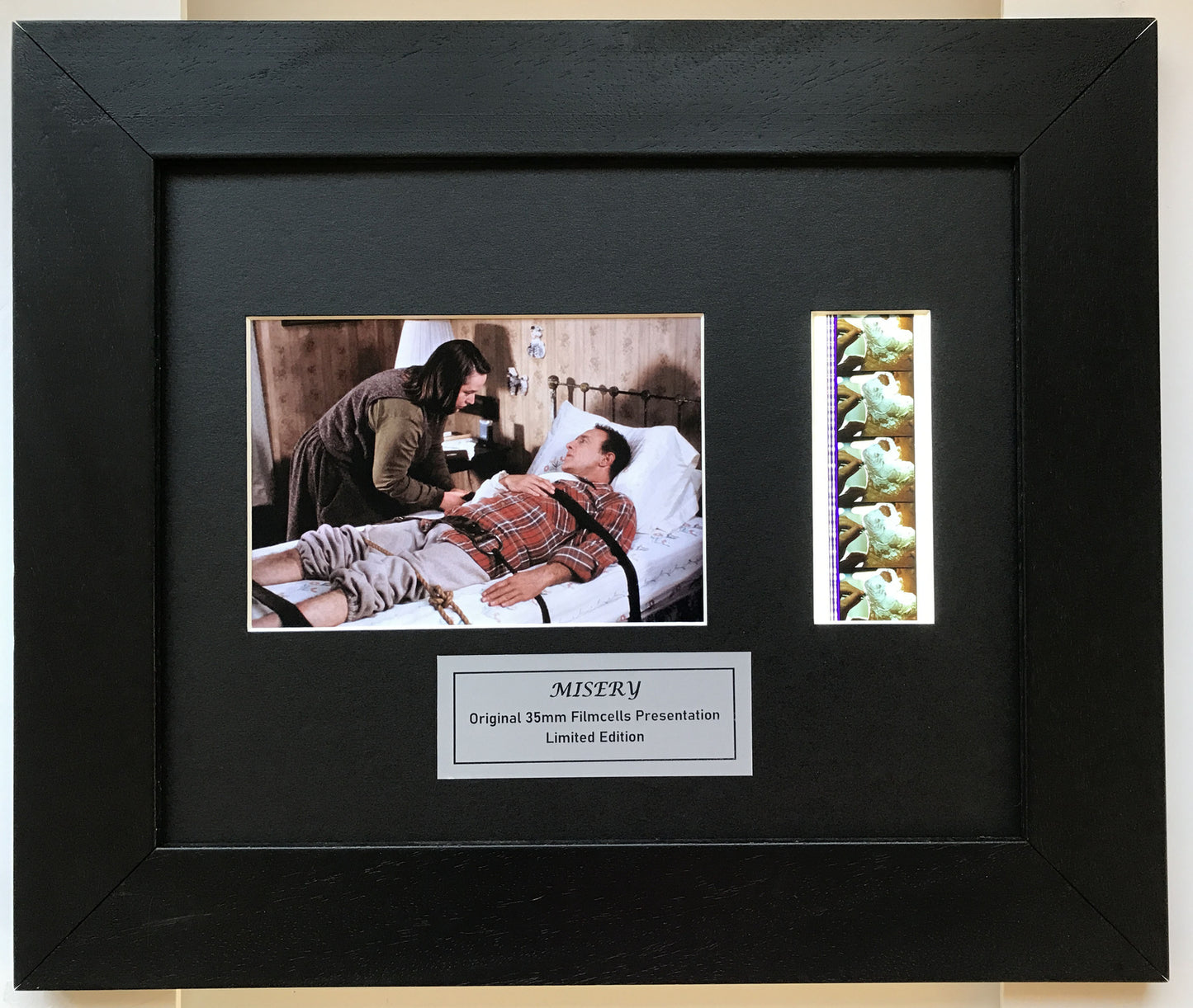 Hand crafted display featuring original 35mm filmcells for a MISERY fan + COA v3