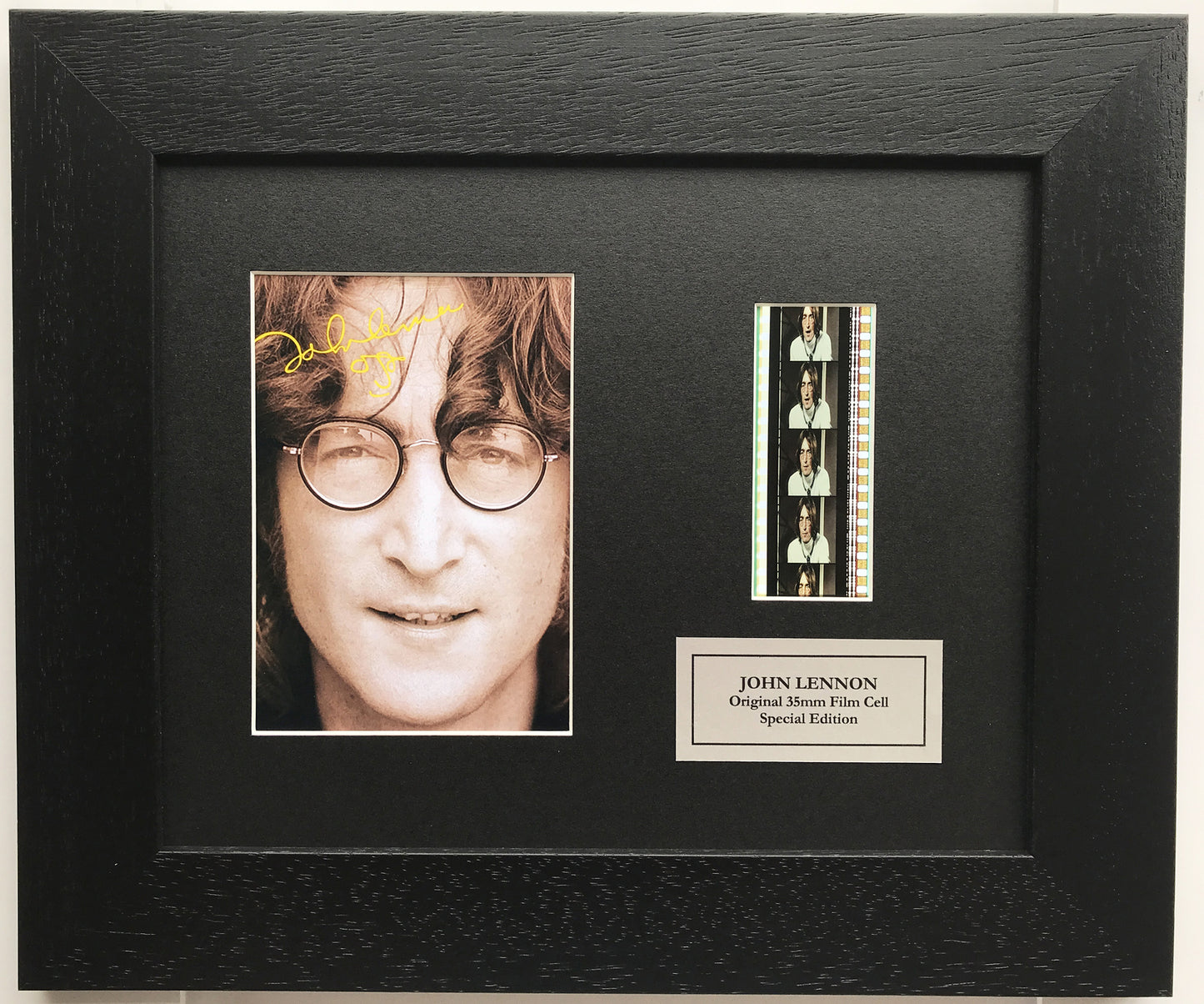 Hand crafted display featuring original 35mm film cells for John Lennon fans
