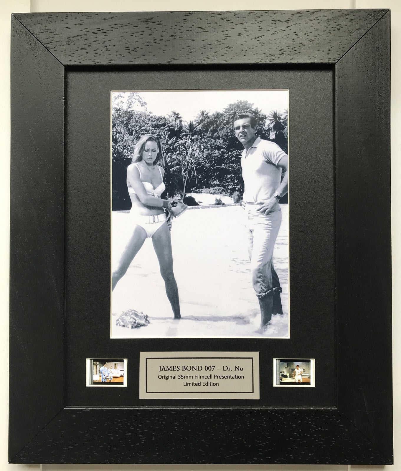 Hand crafted display featuring original film cells for James Bond DR. NO fans