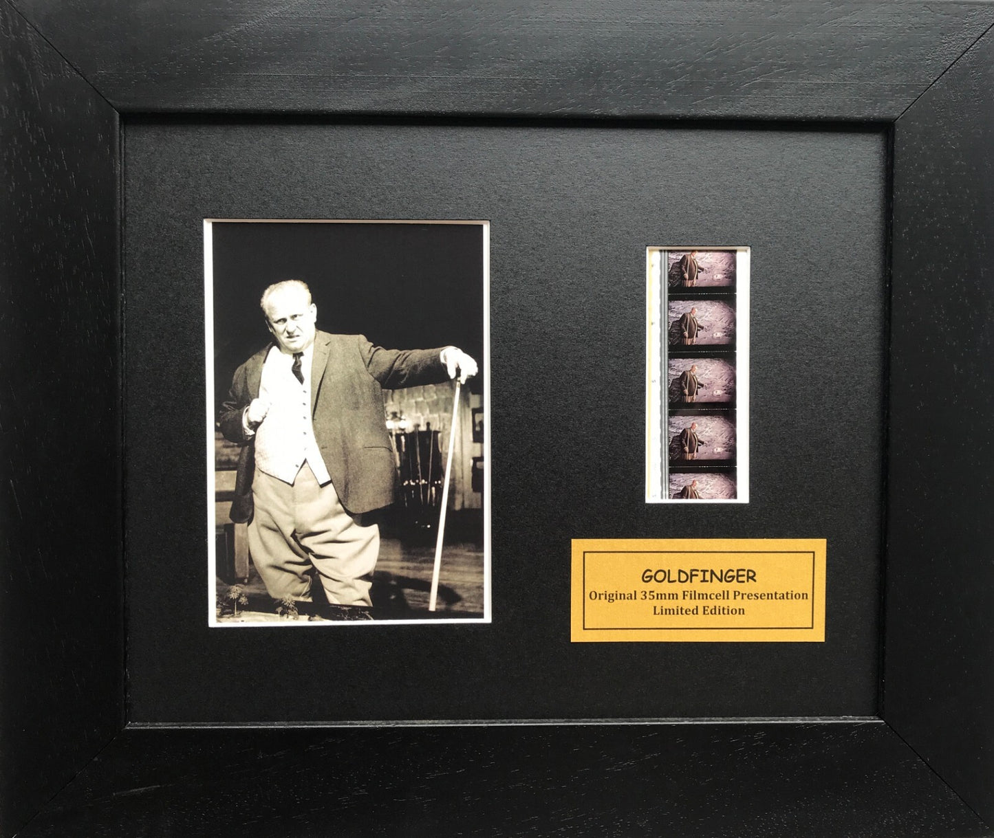 Handmade display featuring original film cells for James Bond GOLDFINGER fans v1