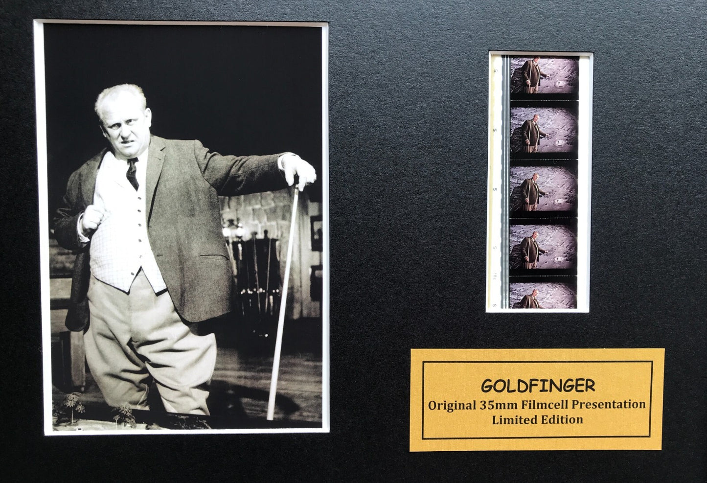 Handmade display featuring original film cells for James Bond GOLDFINGER fans v1