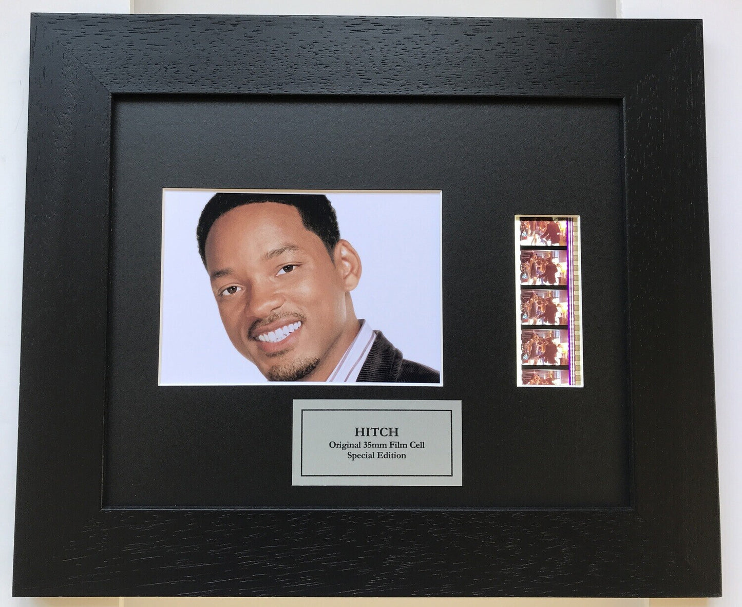 Hand crafted display featuring original 35mm film cells for HITCH fans + COA