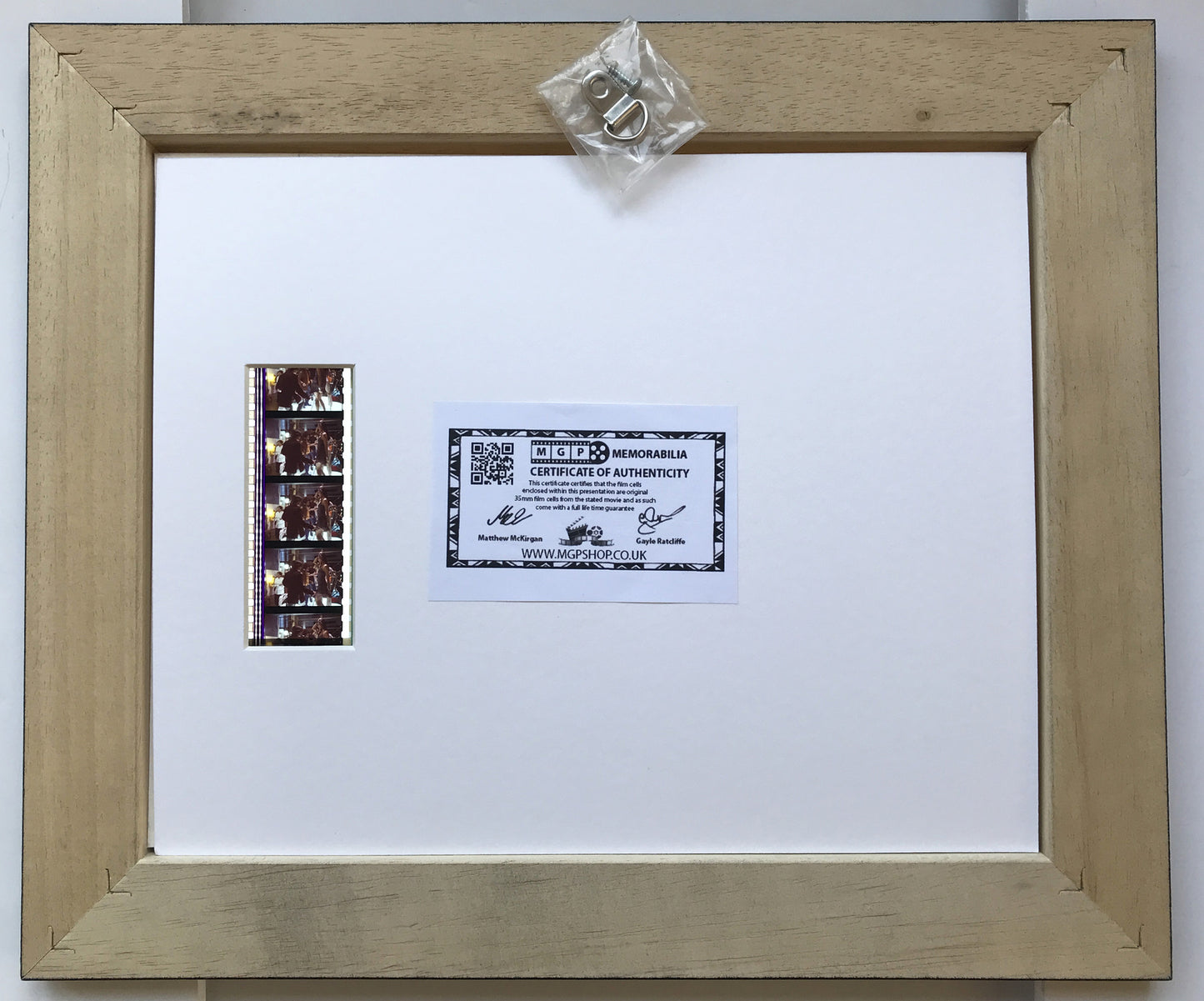 Hand crafted display featuring original 35mm film cells for HITCH fans + COA