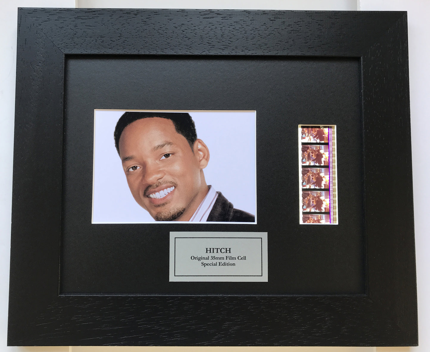 Hand crafted display featuring original 35mm film cells for HITCH fans + COA
