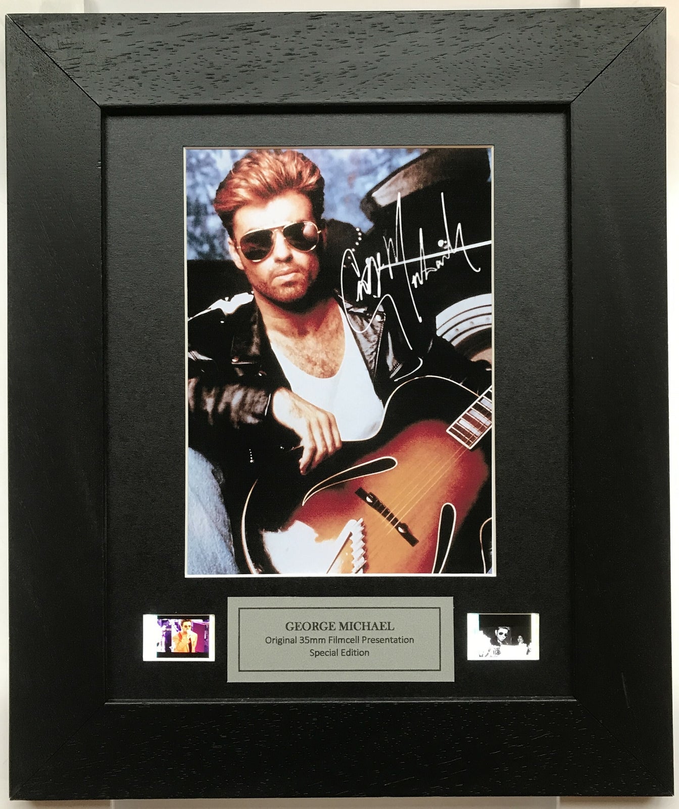 Hand crafted display featuring original film cells for GEORGE MICHAEL fans vSR