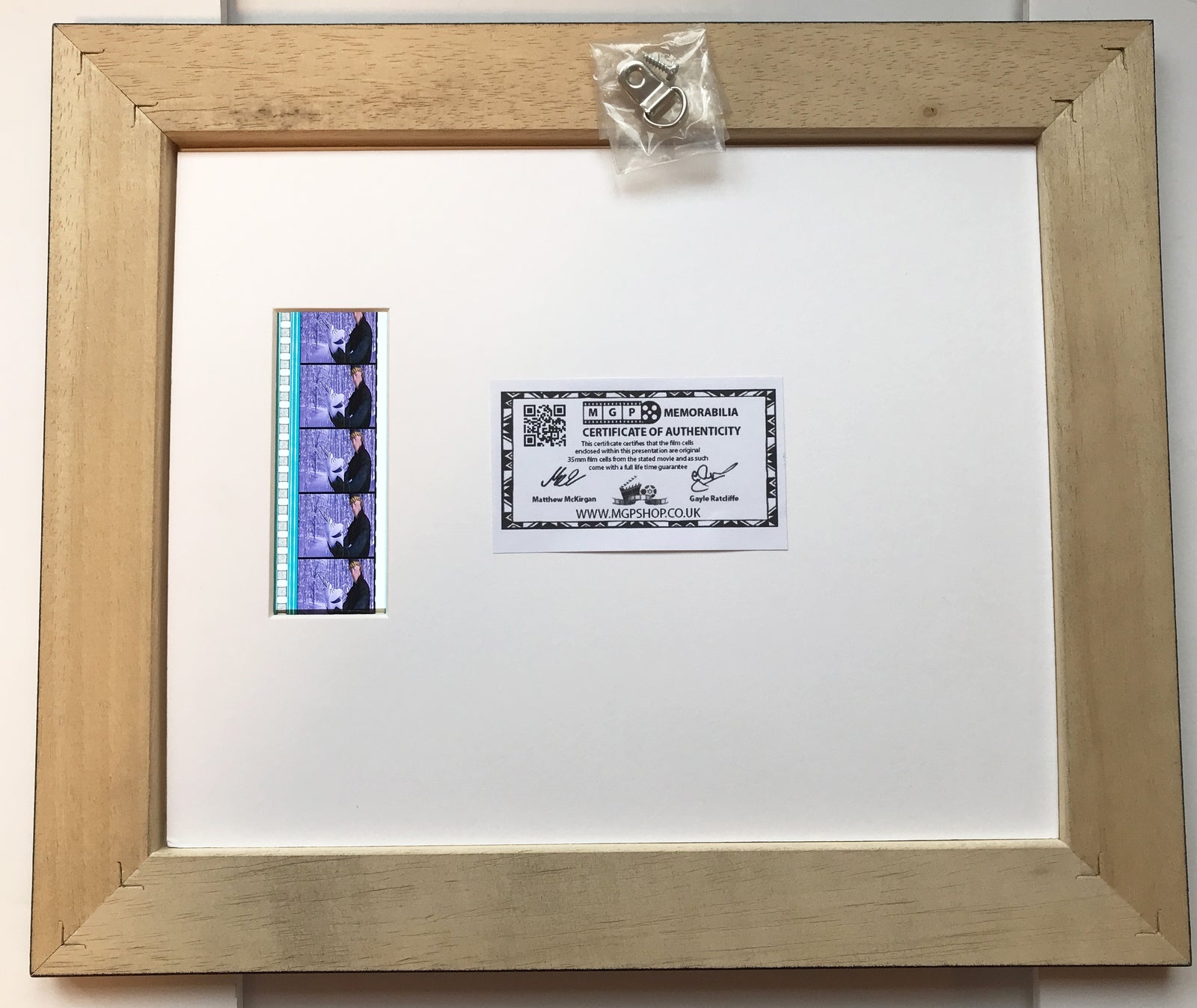 Hand crafted display featuring original 35mm film cells for a FROZEN fan + COA