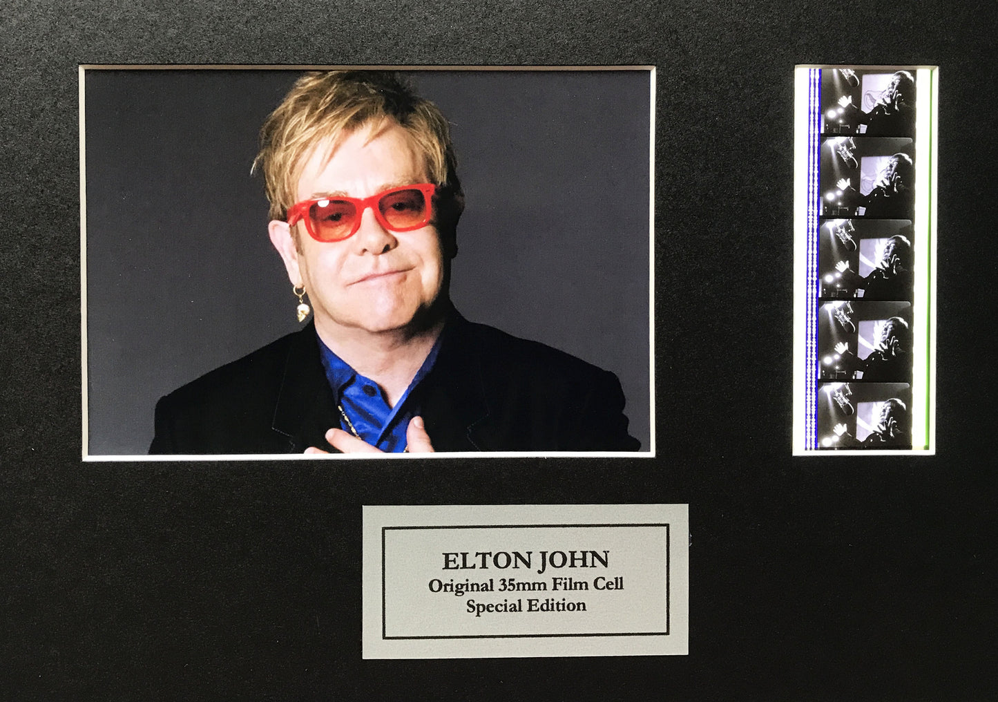 Handmade display featuring original 35mm film cells for ELTON JOHN fans + COA