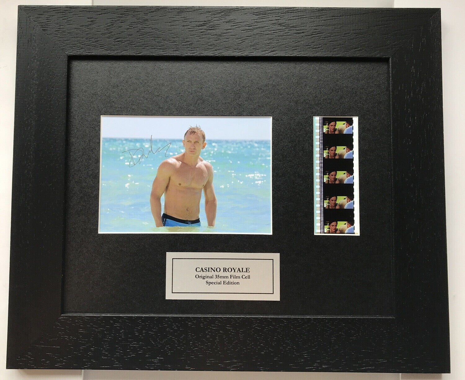 Hand crafted display featuring original 35mm film cells for a DANIEL CRAIG fan