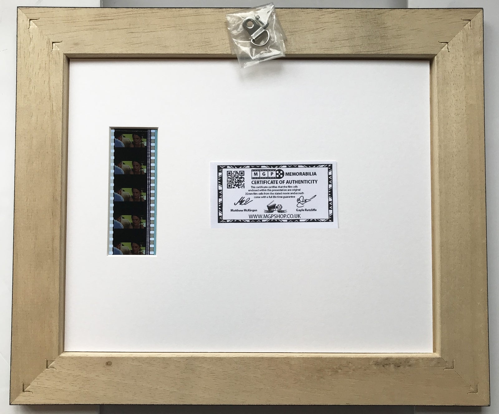 Hand crafted display featuring original 35mm film cells for a DANIEL CRAIG fan