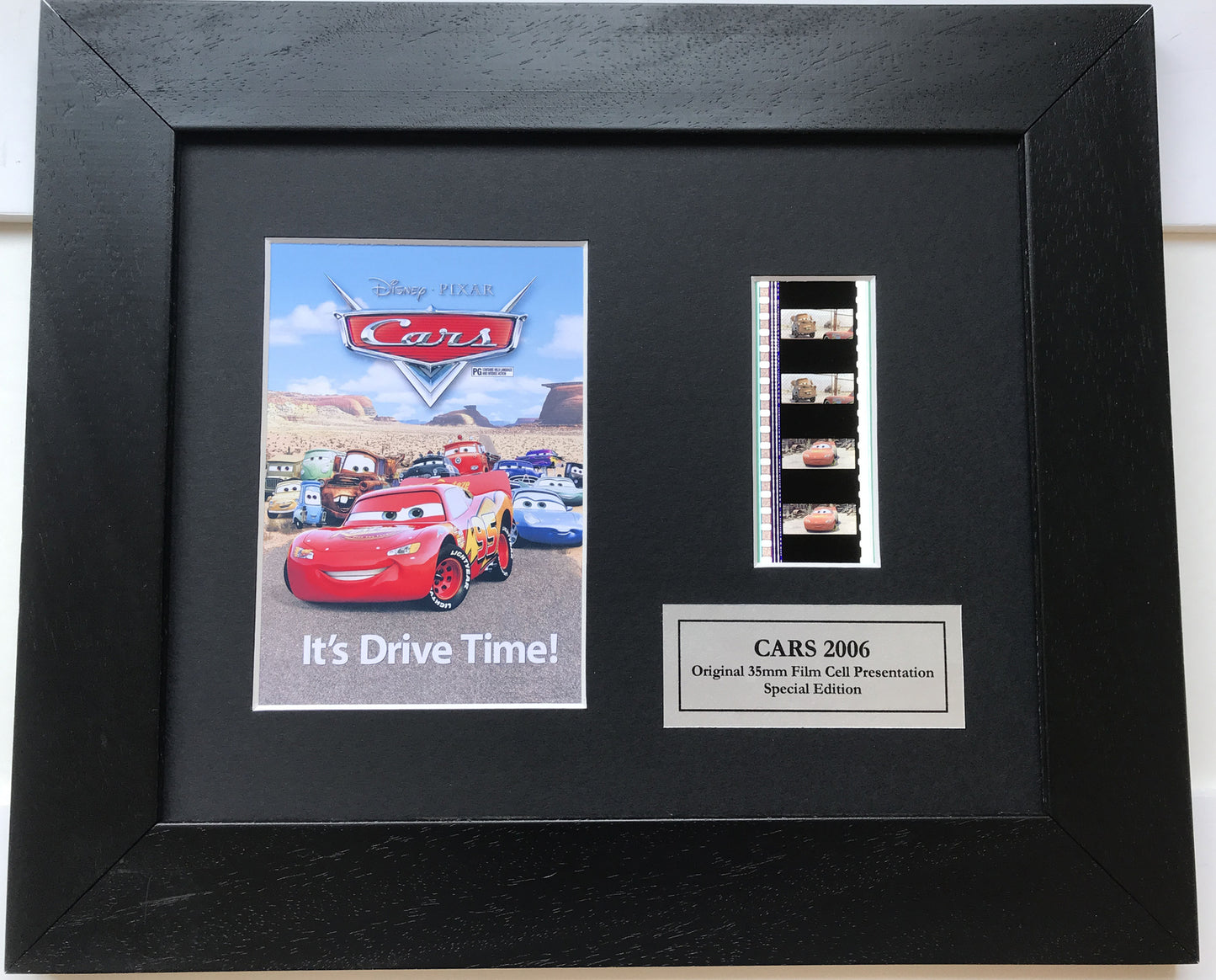 Hand crafted display featuring original film cells for a Cars Movie fan + COA