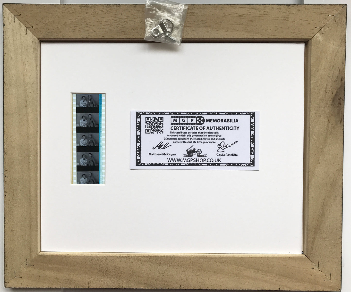 Hand crafted display featuring original 35mm film cells for CARRY ON fans