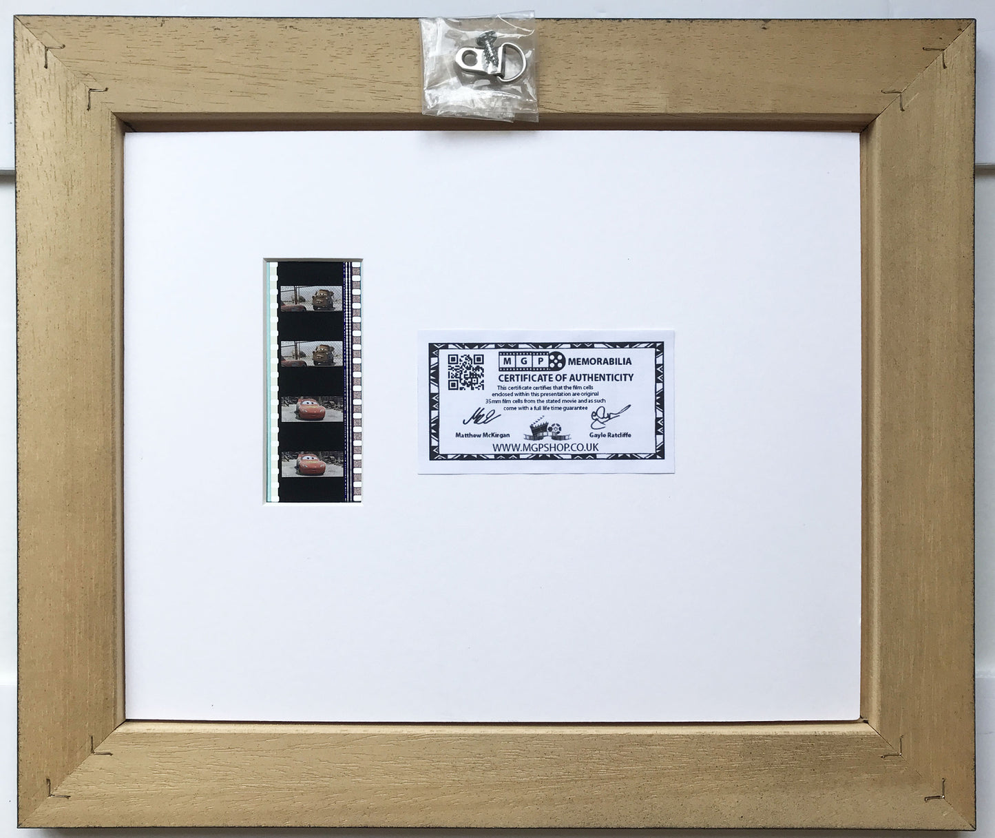 Hand crafted display featuring original film cells for a Cars Movie fan + COA
