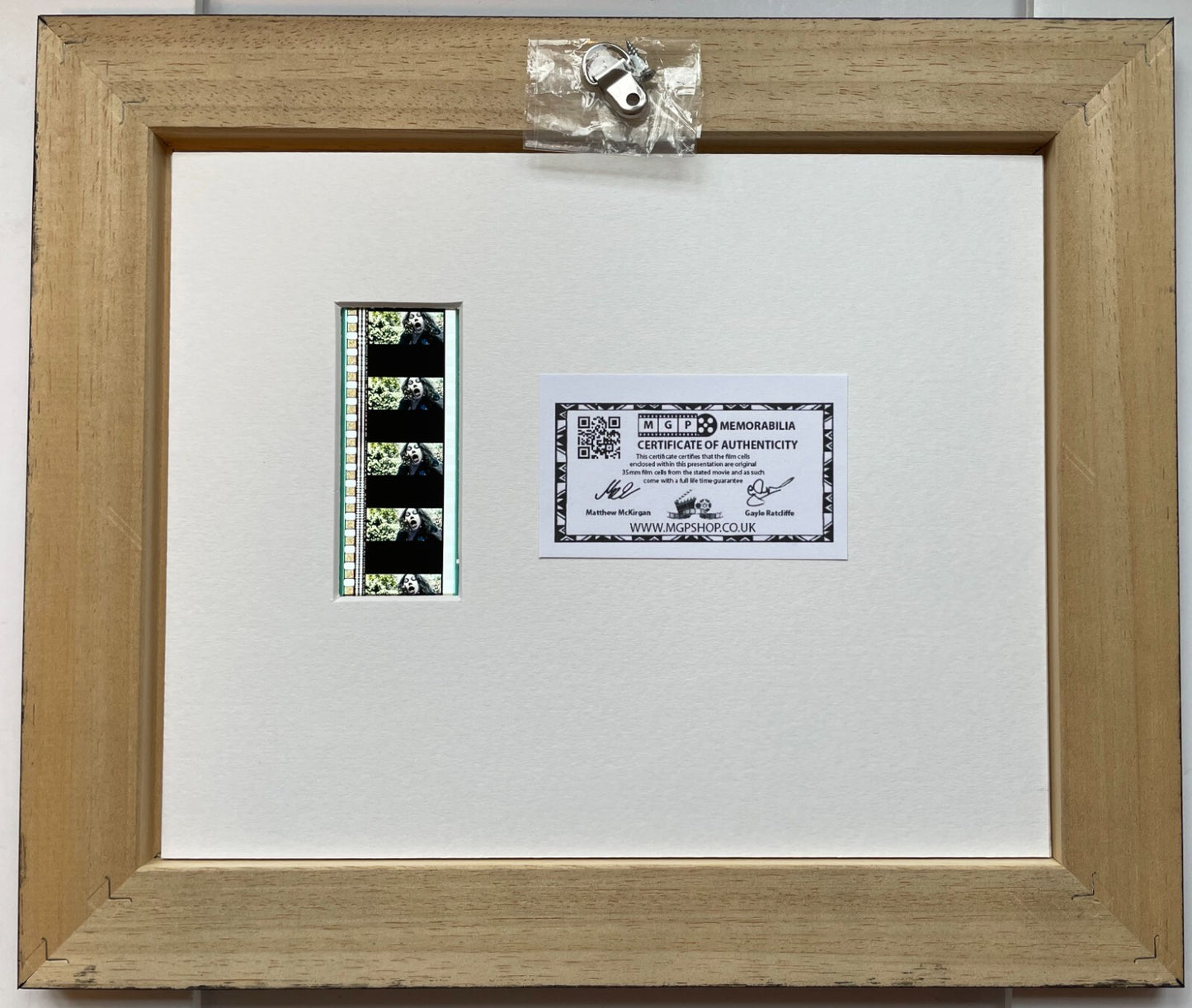 Hand crafted display featuring original 35mm film cells for BRIDE OF CHUCKY fans
